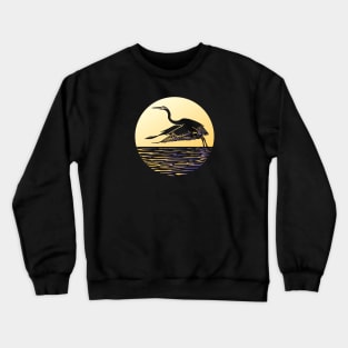 Great Blue Heron Flying in front of Sun Crewneck Sweatshirt